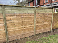 Bespoke slatted fencing by Vincent Fencing
