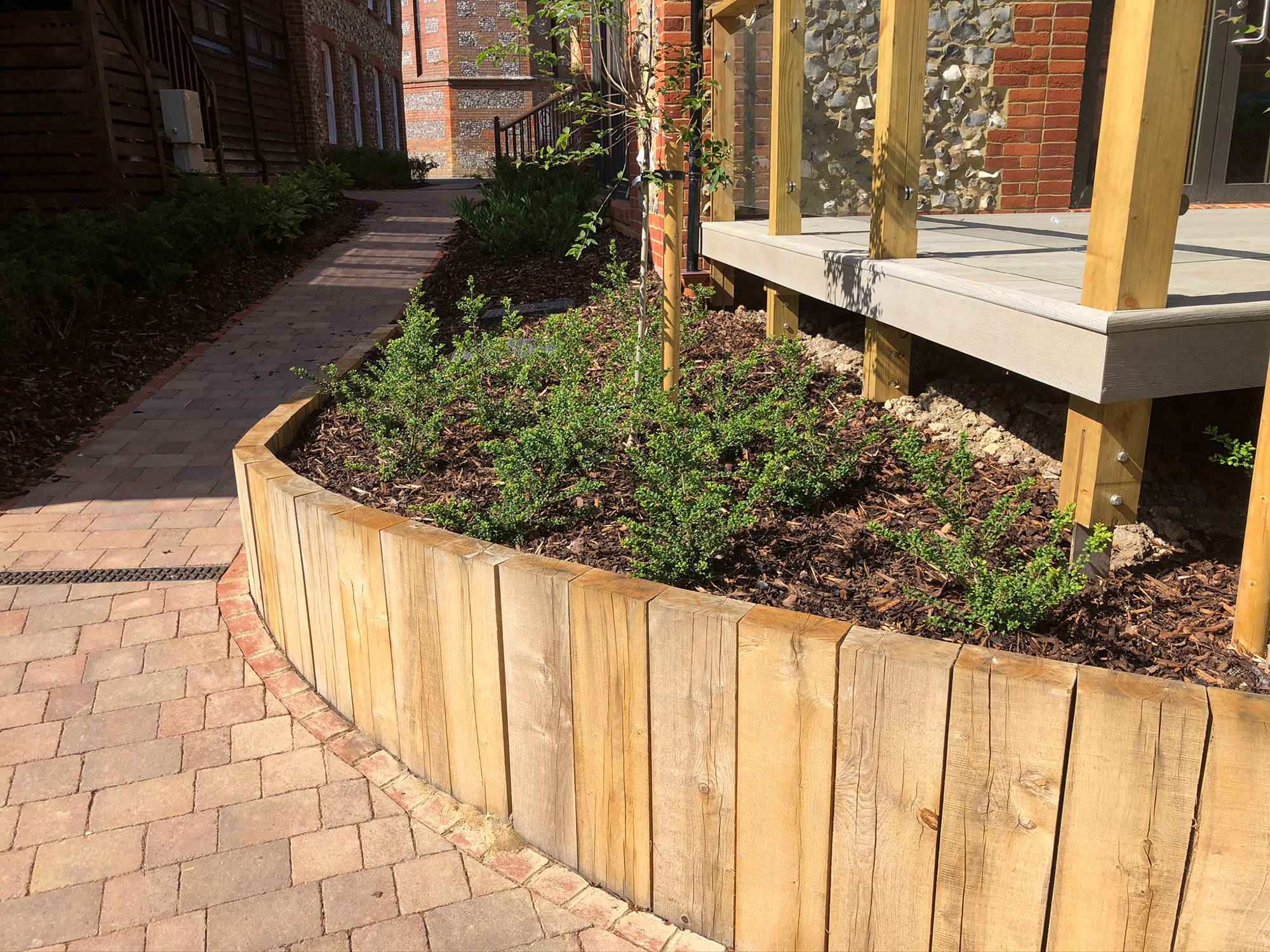 Retaining Sleeper Wall by Vincent Fencing